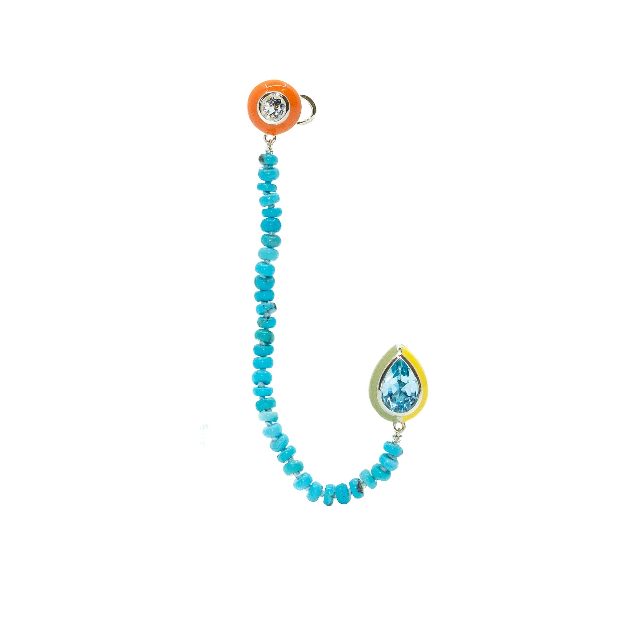 A clip-on ear chain featuring a round white topaz gemstone with a blue and orange enamel accent and bezel-set topaz gems.