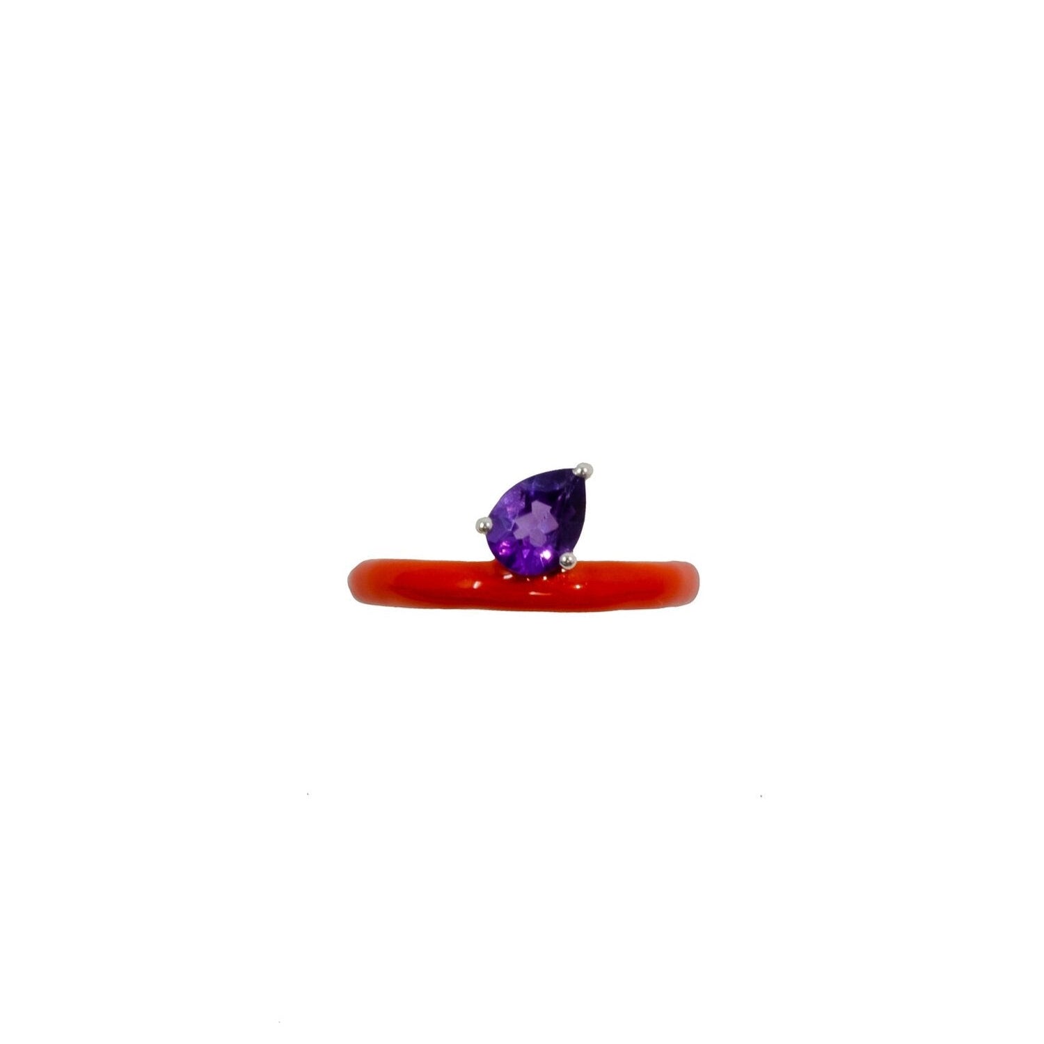 A red enamel ring with a purple amethyst gemstone set in a sterling silver band, designed for stacking.