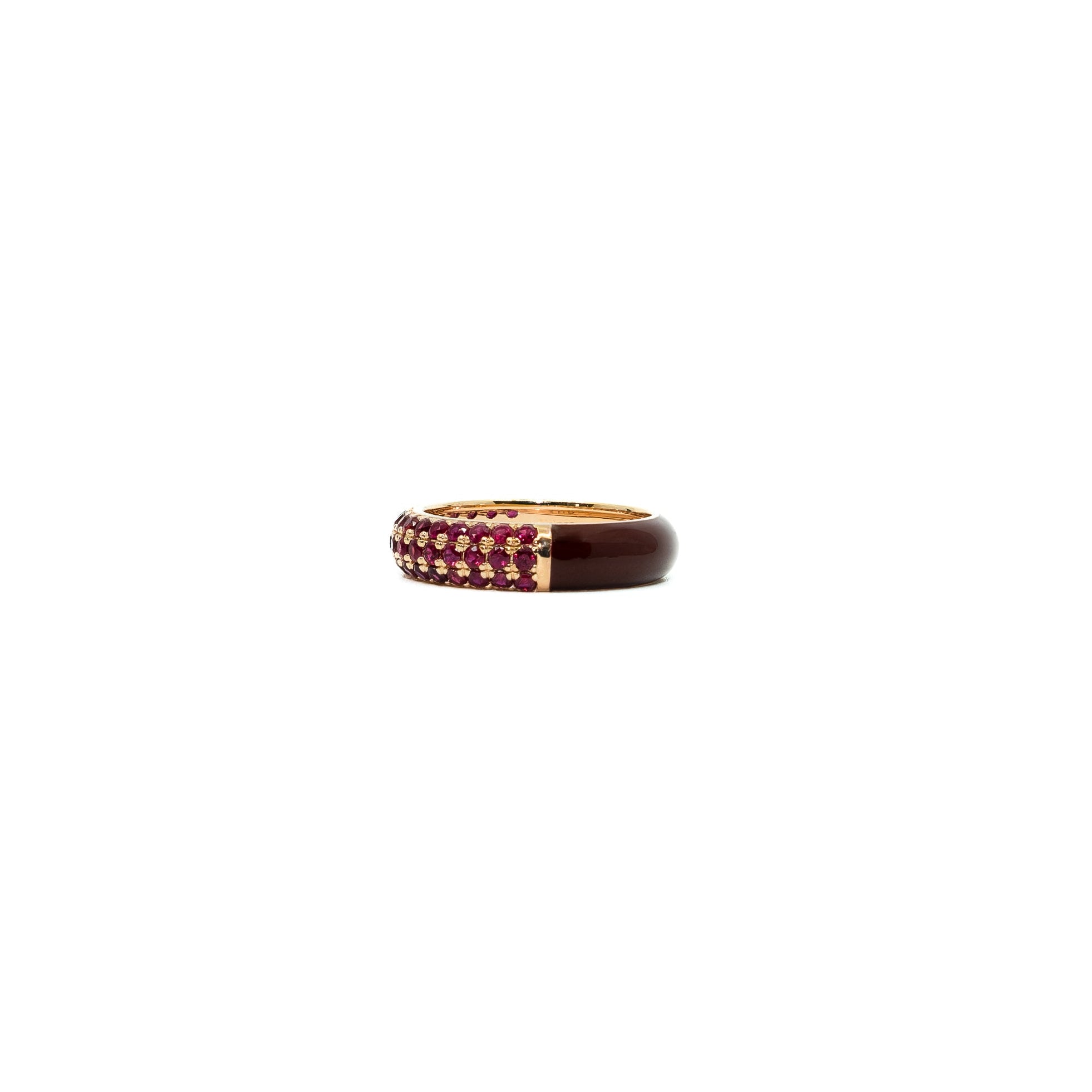 Gold ring with deep red enamel with ruby red gemstones on a white background