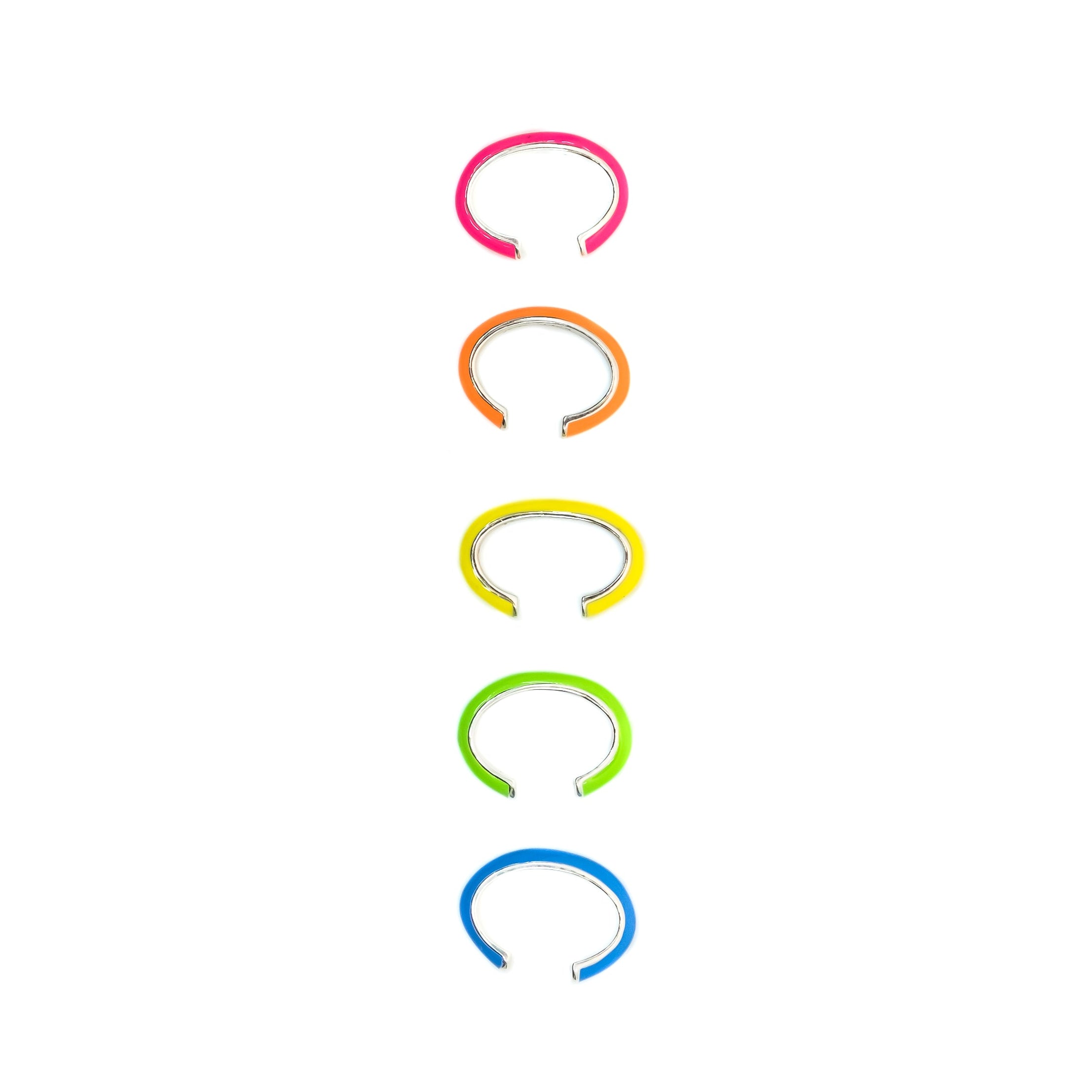 A stack of four neon colored enamel ear cuffs in orange, yellow, pink, and blue, displayed in a vertical arrangement on a white background.