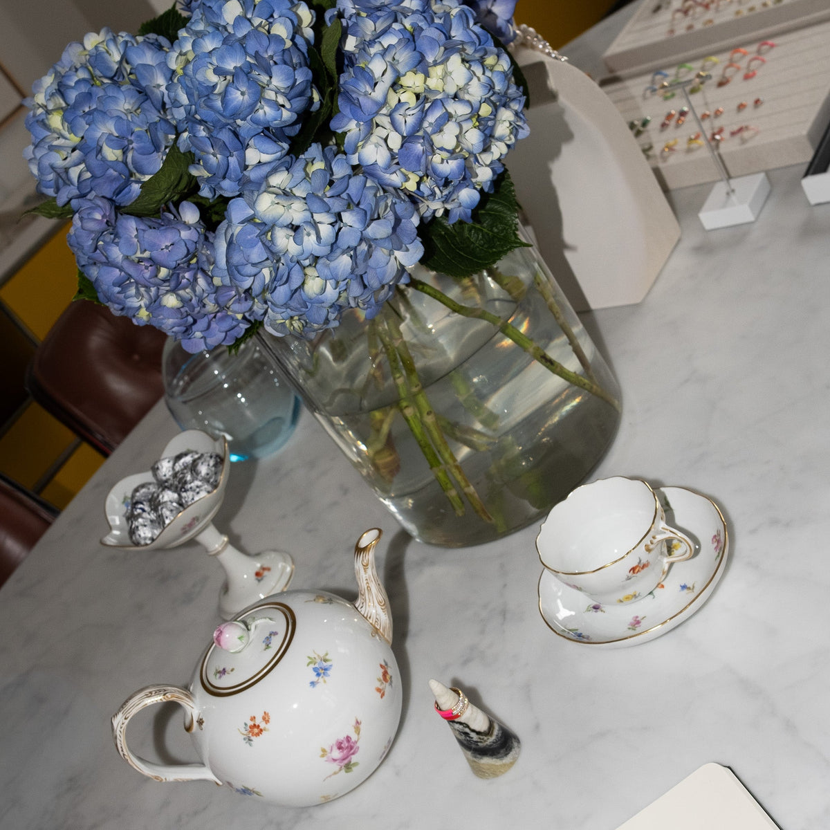 Blue hydrangeas, tea service and FRY POWERS jewelry in the Downtown Manhattan studio.